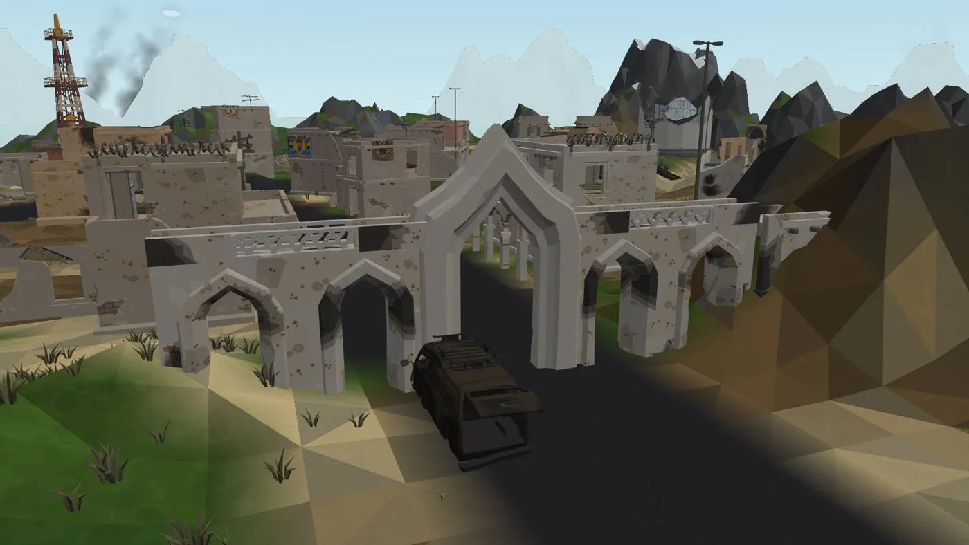 Temple: a ruined arched gate in a desert town